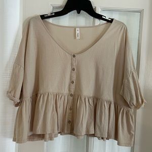 Cropped, peplum style top